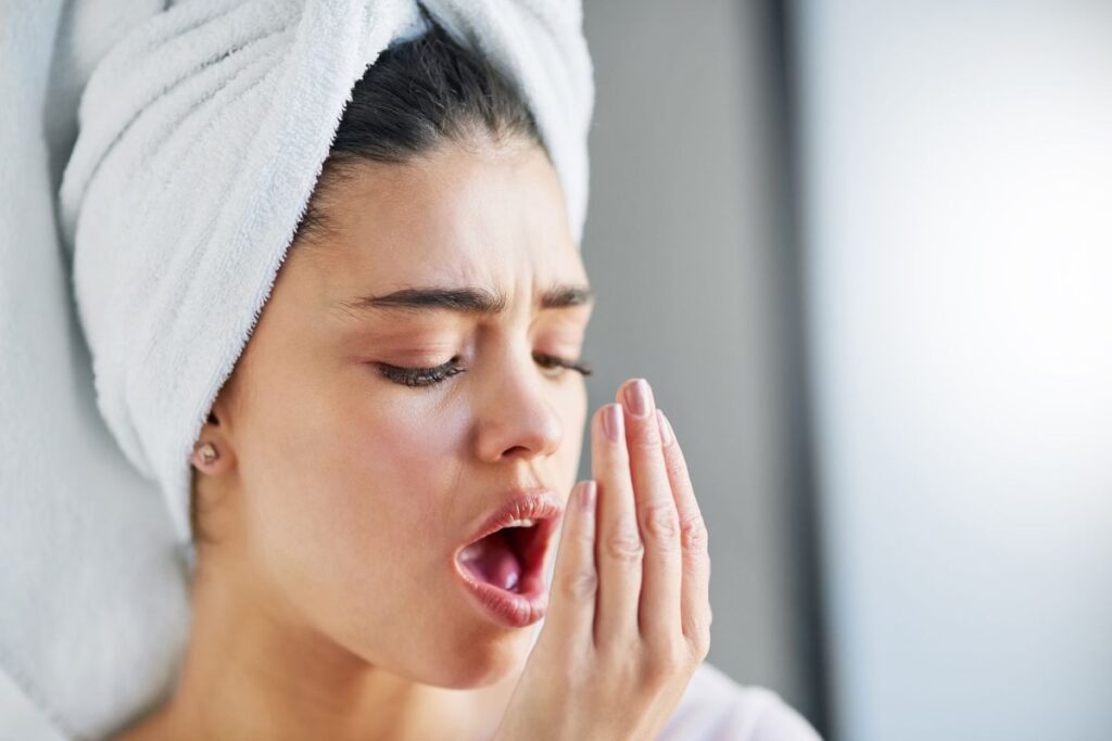 Keep Teeth Healthy with a Busy Lifestyle by maintaining good oral hygiene to prevent bad breath, cavities, and gum disease through consistent daily brushing, flossing, and regular dental checkups.
